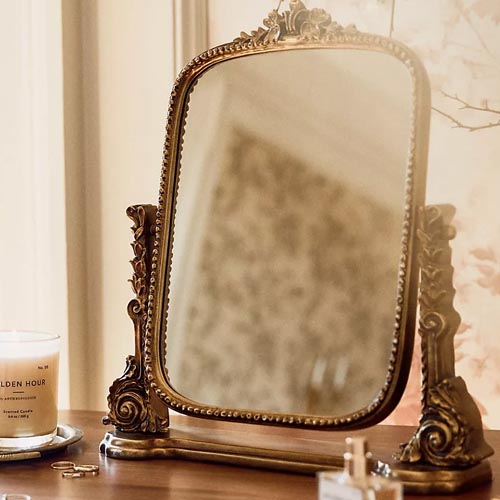 This gold vanity mirror is a stunning gift to give this holiday season! #ABlissfulNest