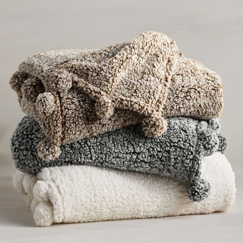 This pom pom sherpa throw blanket is a great under $50 holiday gift idea! #ABlissfulNest