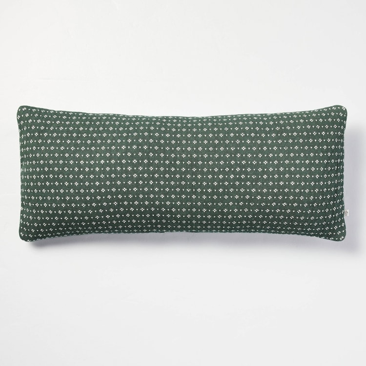 This green knit throw pillow is perfect to add to your holiday decor this season! #ABlissfulNest