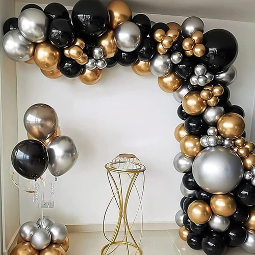 This gold black and silver balloon arch is under $10 and a New Year's Eve party must have! #ABlissfulNest