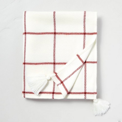 This red and cream windowpane throw blanket is the perfect Christmas throw blanket! #ABlissfulNest