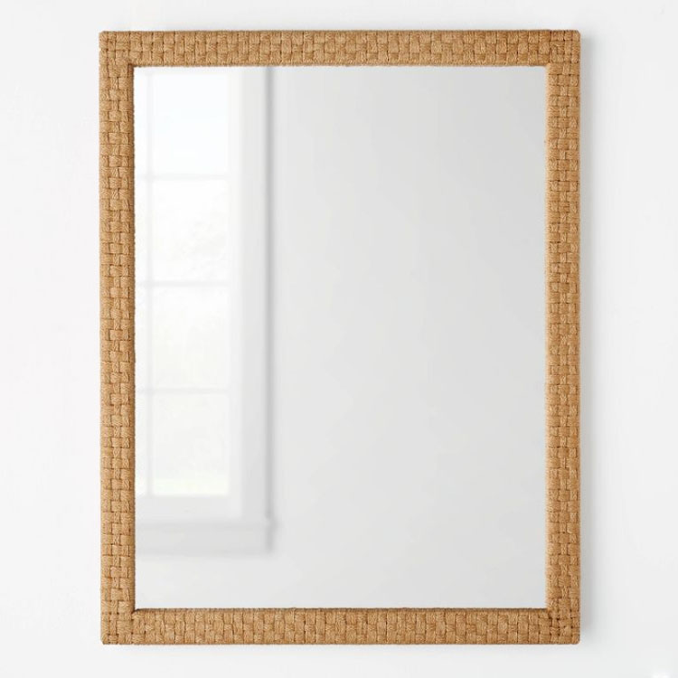 This woven wall mirror is so pretty and under $100! #ABlissfulNest