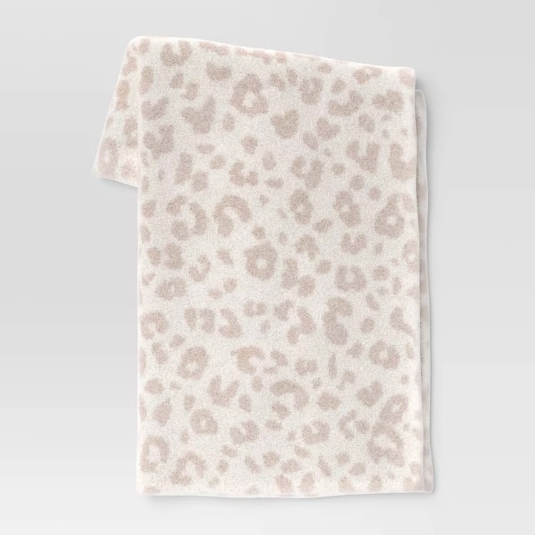 This leopard printed blanket is a perfect Barefoot Dreams dupe! #ABlissfulNest