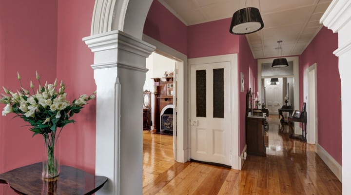 Terra rossa paint color on walls in a entry