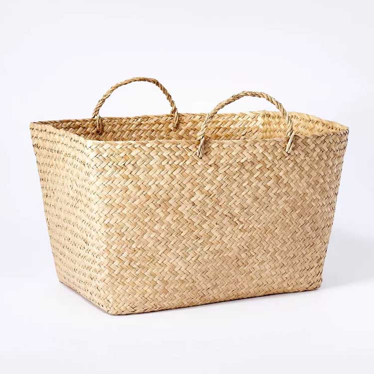 This woven seagrass basket is perfect to store blankets, pillows, etc in your living room or bedroom! #ABlissfulNest