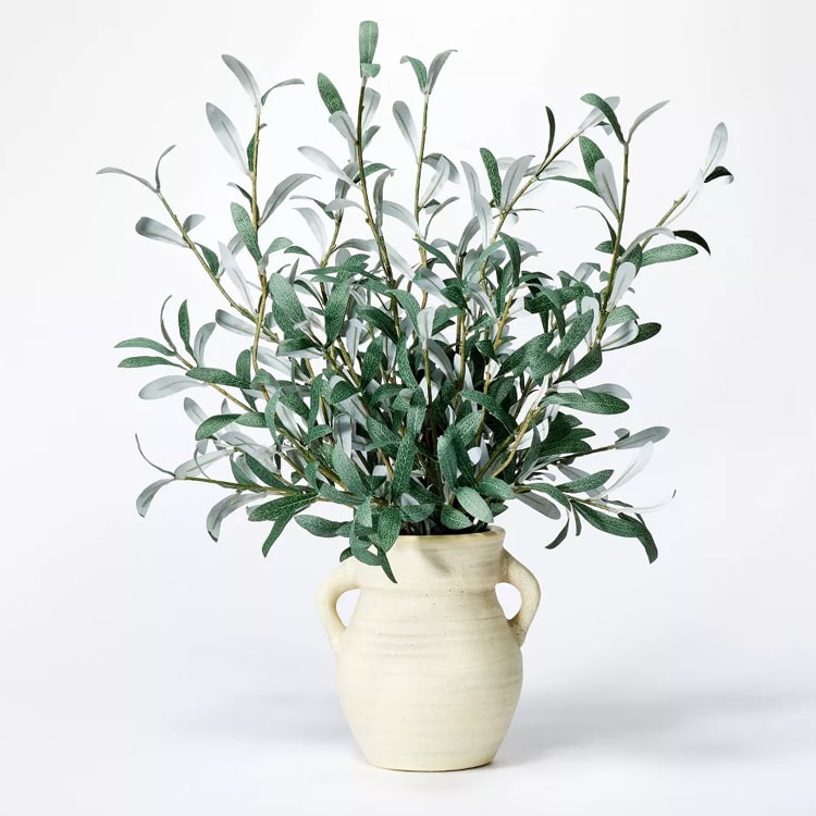 This faux olive leaf arrangement is perfect to add to your home for spring! #ABlissfulNest