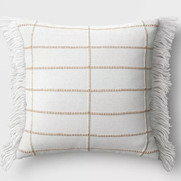 This oversized woven throw pillow is perfect to add to your outdoor living decor this season! #ABlissfulNest