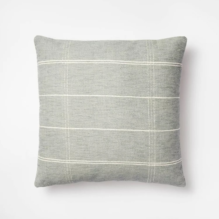 This green and cream woven throw pillow is so pretty for the spring! #ABlissfulNest