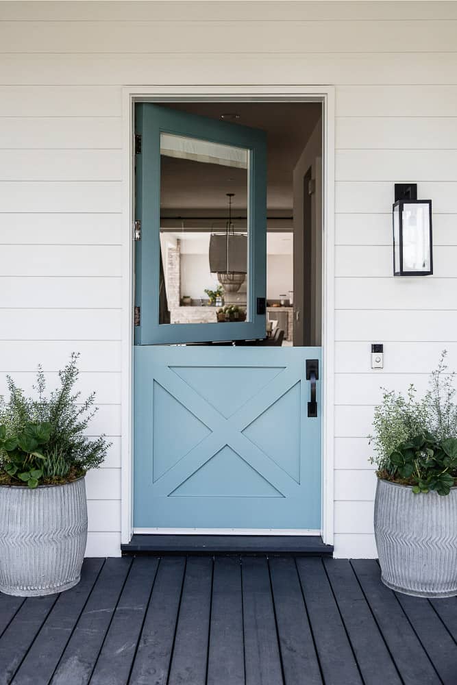 Light blue door with split panels so the top opens.