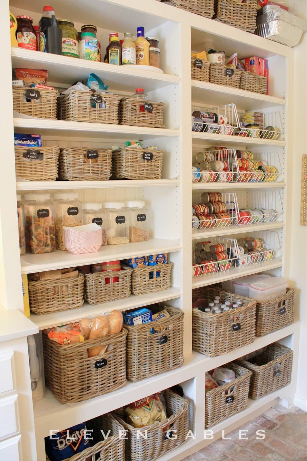 canned good storage using metal baskets and baskets for larger items.