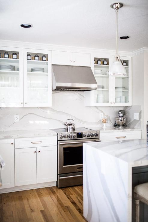 https://ablissfulnest.com/wp-content/uploads/2023/04/pure-white-neutral-kitchen-cabinet-colors.jpeg