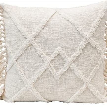 This cotton blend tufted tassel throw pillow is so pretty for spring! #ABlissfulNest