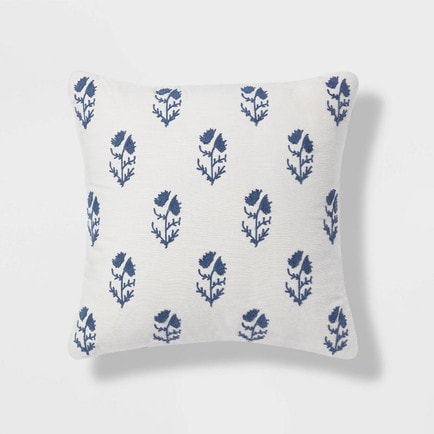 This blue floral embroidered throw pillow is perfect for spring! #ABlissfulNest