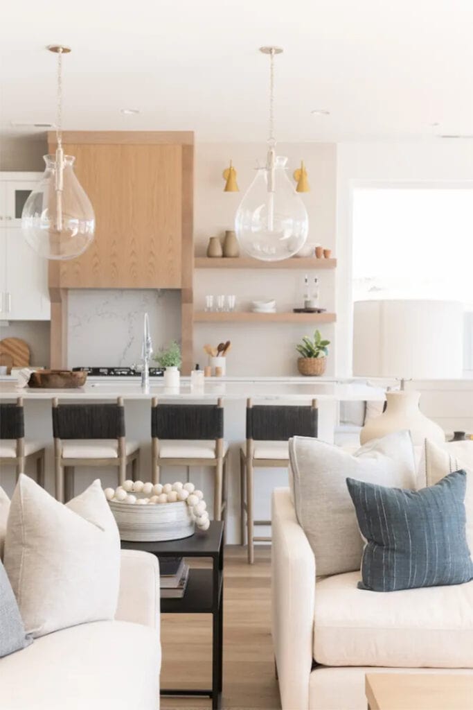 This open concept kitchen and living area designed by Becki Owens Design is stunning! #ABlissfulNest