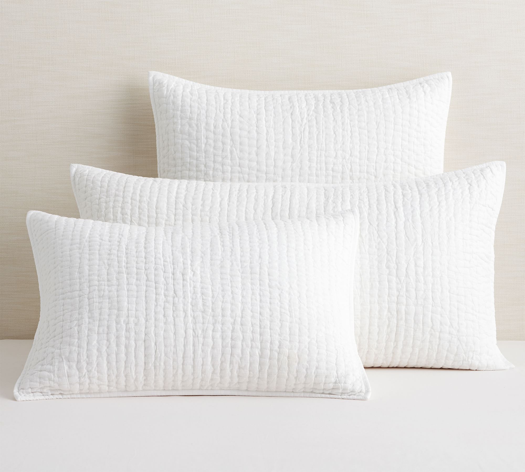 quilted standard sham pillows to use on a bed for layering