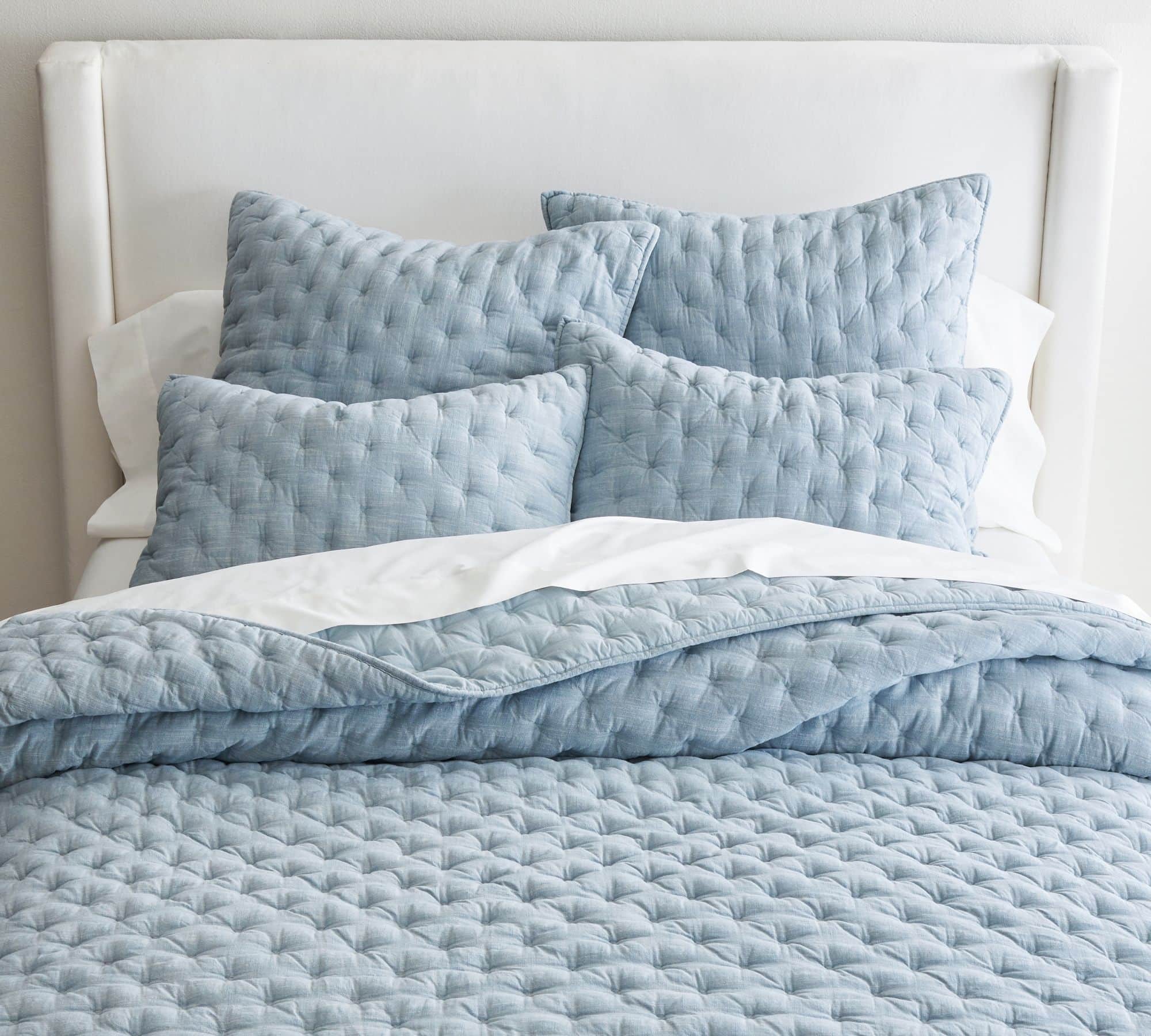 light blue quilt with matching euro shams
