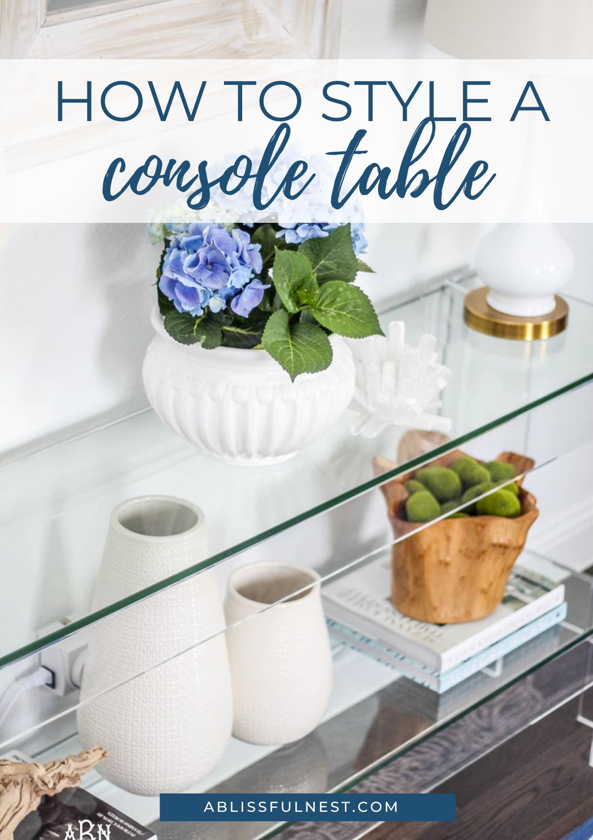 decorative items on a console table that are an eclectic mix 