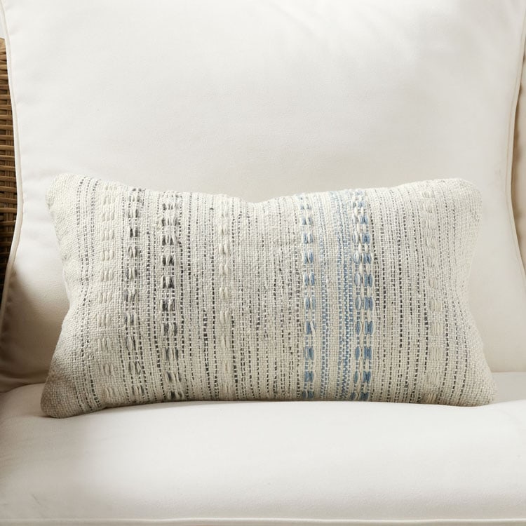 This textured outdoor throw pillow is perfect to add to your patio this season! #ABlissfulNest