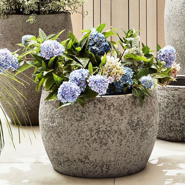 These handcrafted stone planters are perfect for your patio this summer! #ABlissfulNest