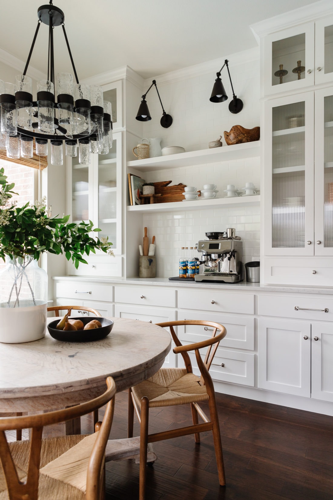 white kitchen with espresso machine on counter