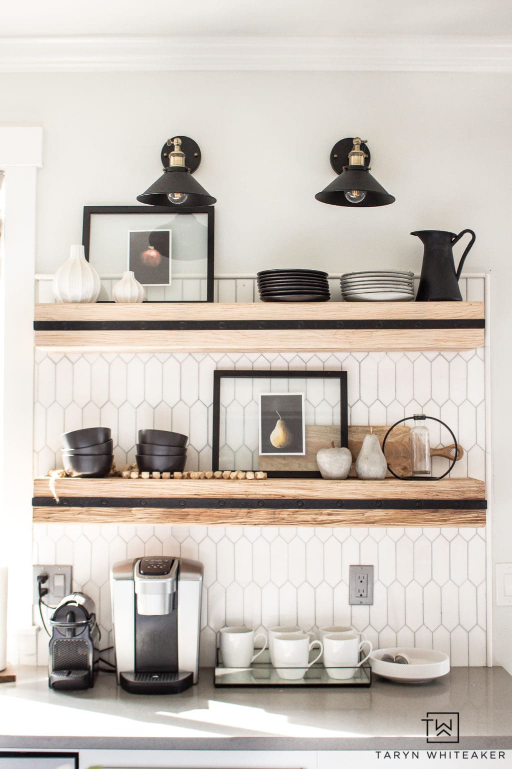 Coffee bar with floating shelves and black bowls and white coffee mugs