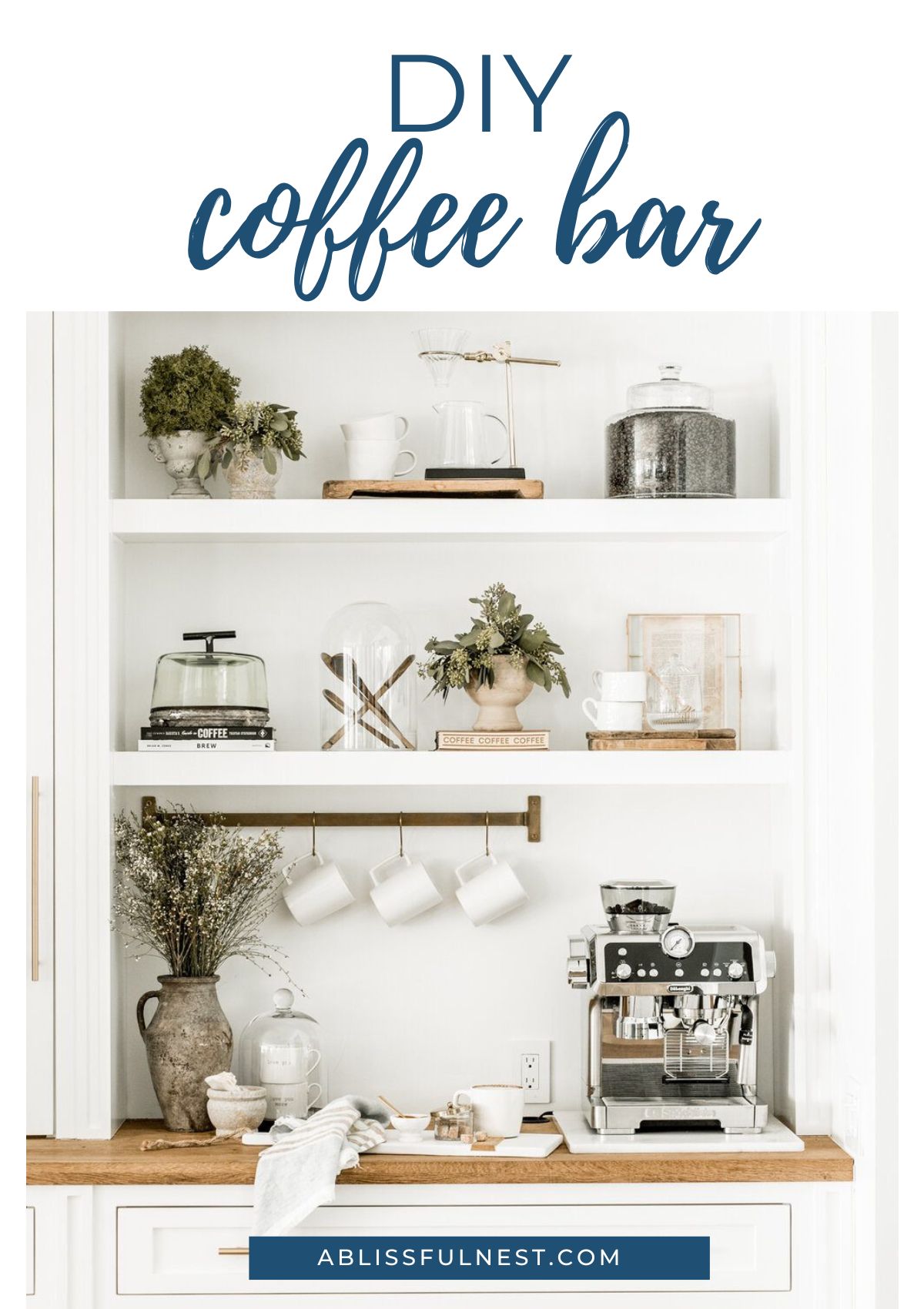 espresso machine, white coffee mugs, tray to help keep clean when making coffee