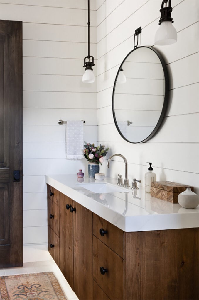 This stunning bathroom designed by Carrie Delany Interiors is such an inviting bathroom! #ABlissfulNest