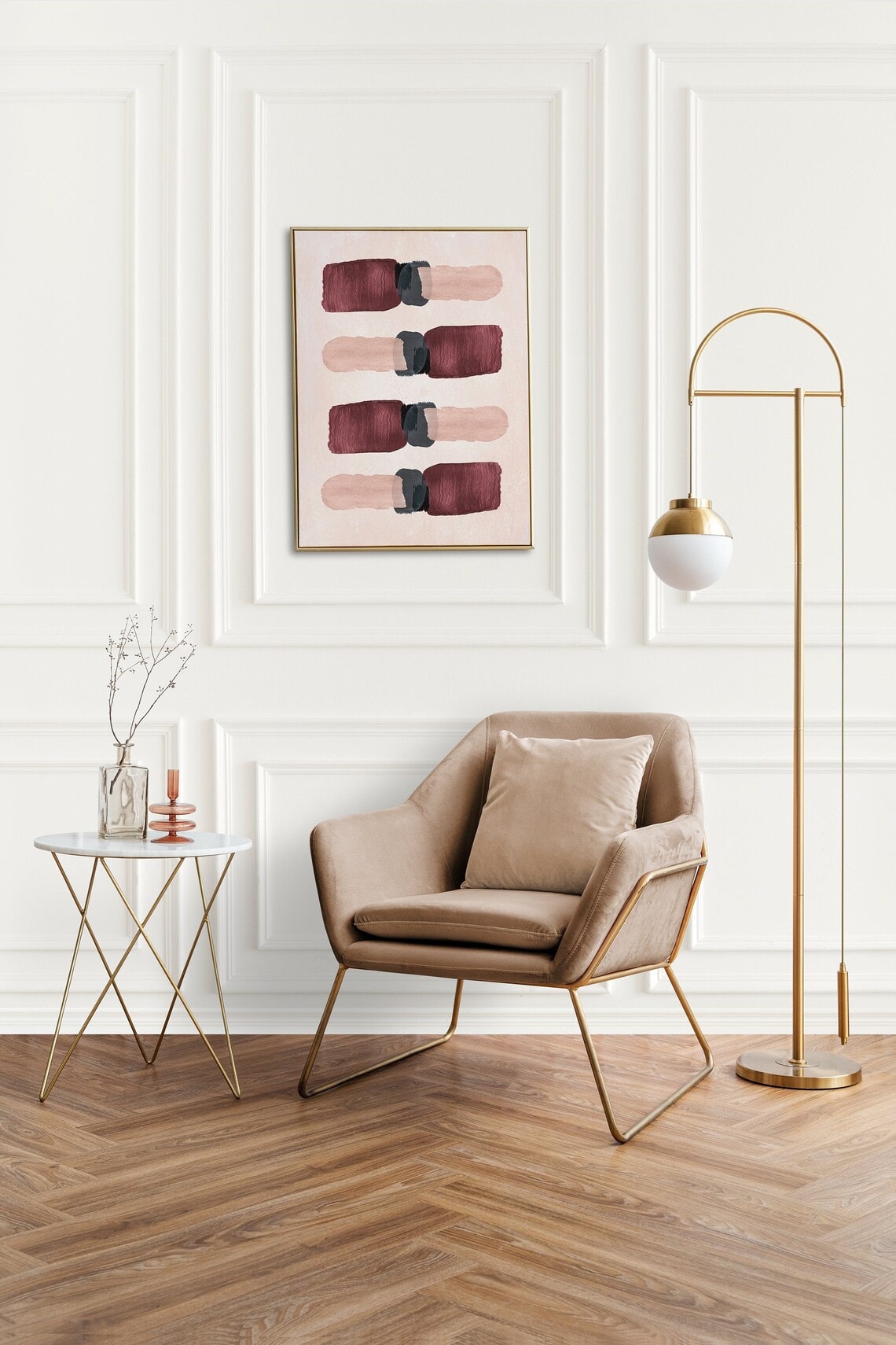 Burgundy and soft pink modern artwork framed in gold above a side chair