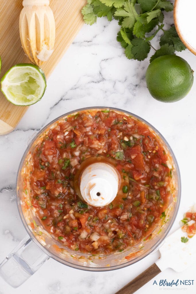minced ingredients in a food processor to make salsa