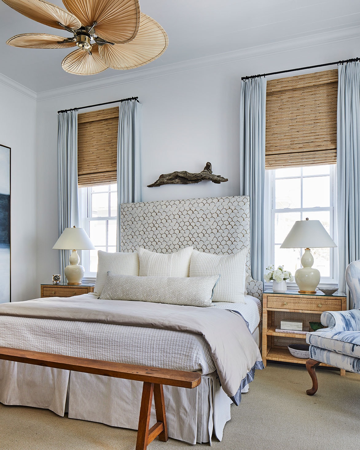 reclaimed wood branch mounted above a bed