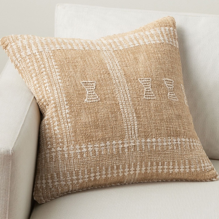 This neutral woven throw pillow is perfect for fall! #ABlissfulNest