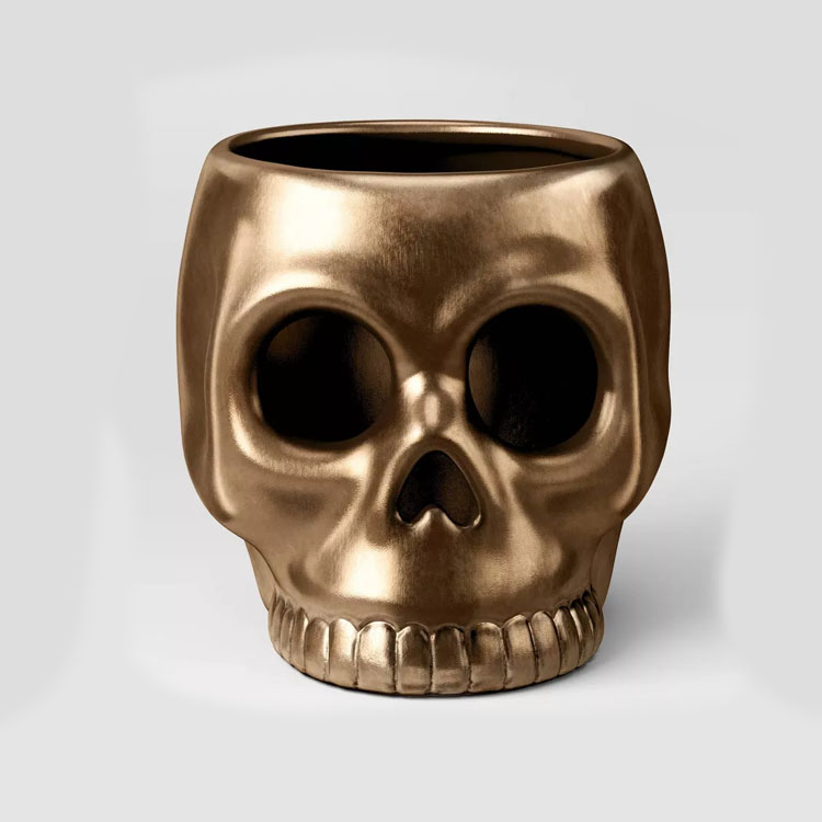 This gold skull candle holder is the perfect, subtle Halloween decoration to add to your home! #ABlissfulNest