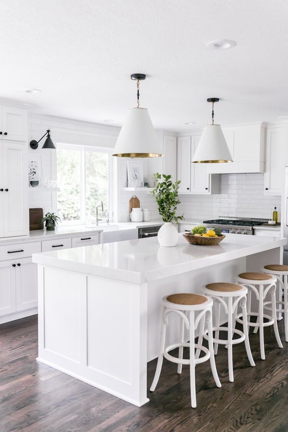 white kitchen cabinets with black cabinet hardware