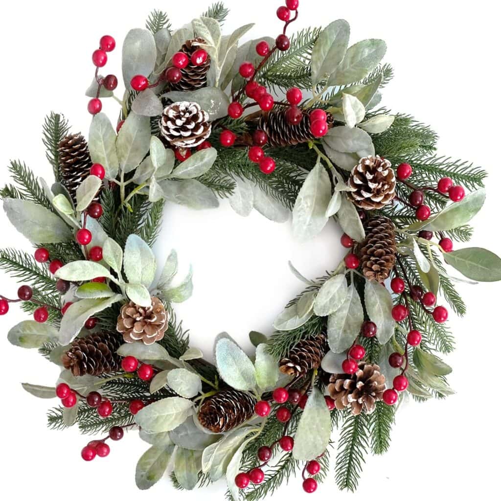 This pinecone and berry Christmas wreath is an under $30 Amazon find! #ABlissfulNest