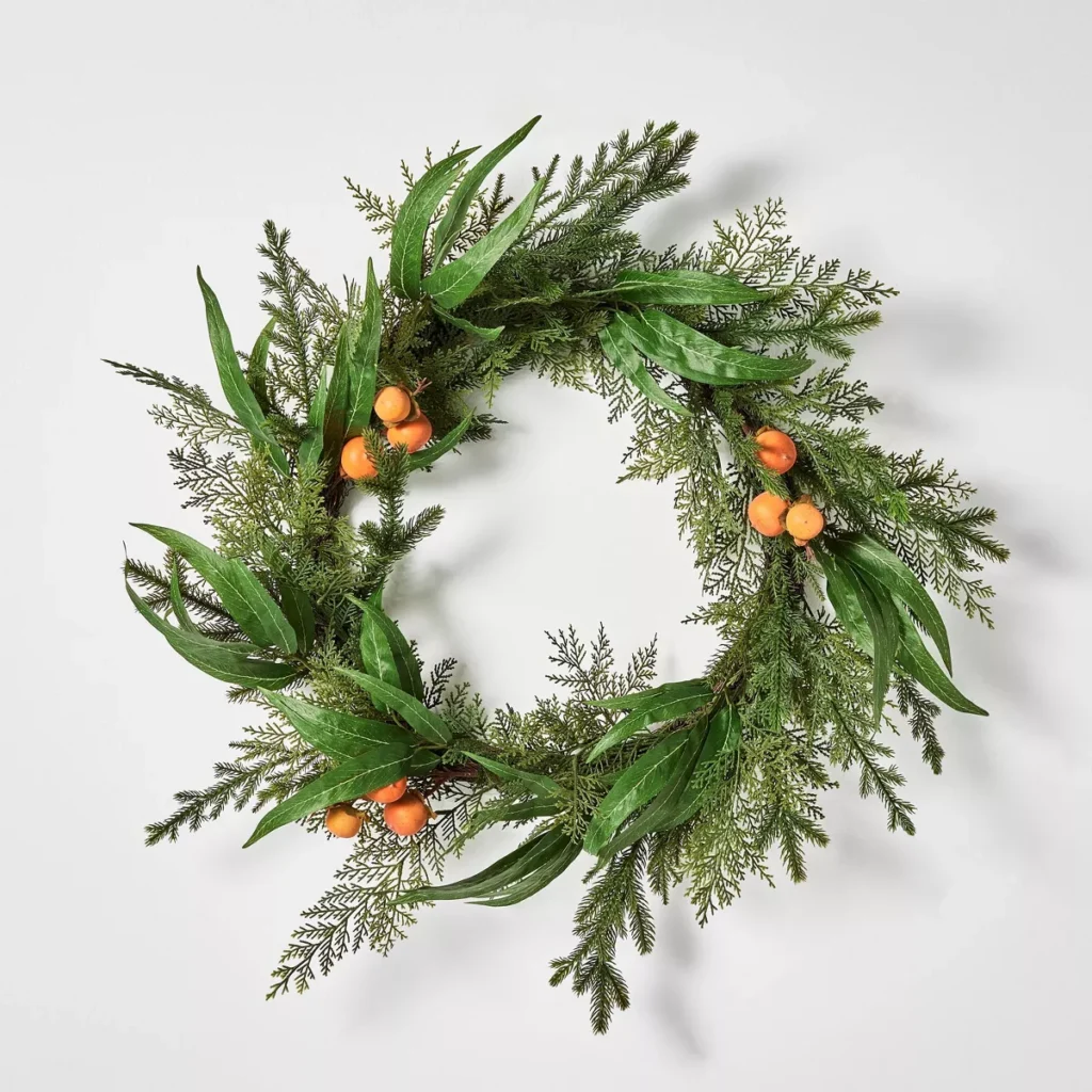 This greenery wreath is filled with the prettiest, mini oranges! #ABlissfulNest
