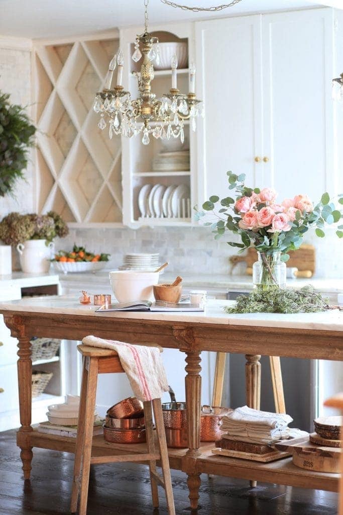 white cottage kitchen with vintage crystal chandelier
