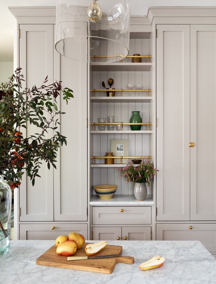 beige kitchen cabinets with gold hardware