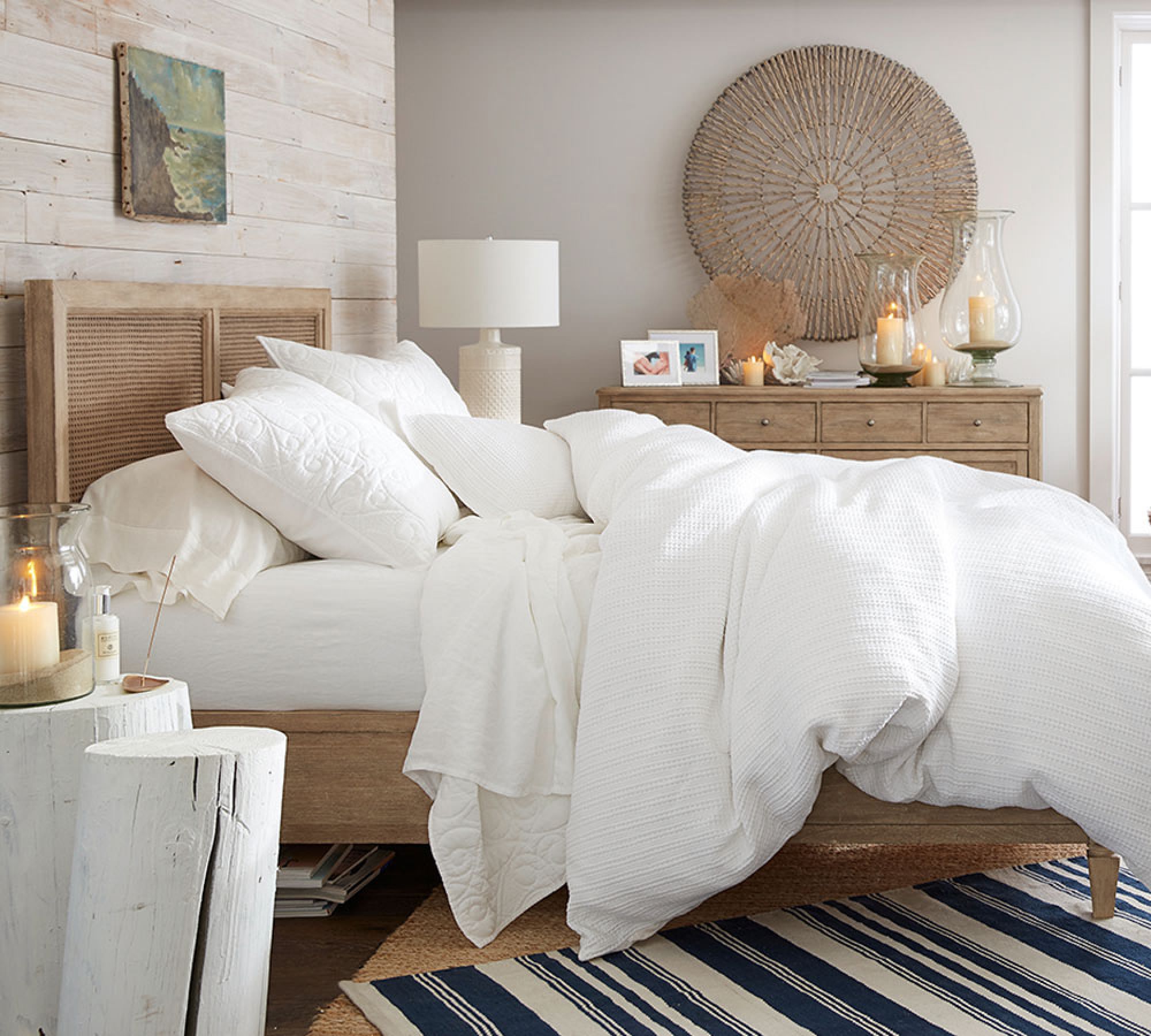 all white bedding in a boho bedroom