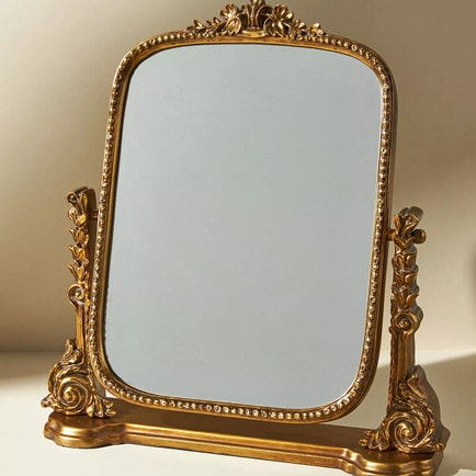 This gold gleaming primrose vanity mirror is such a great gift idea for her! #ABlissfulNest