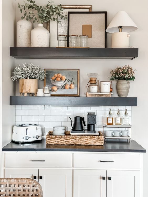 floating shelves above a counter with a coffee bar