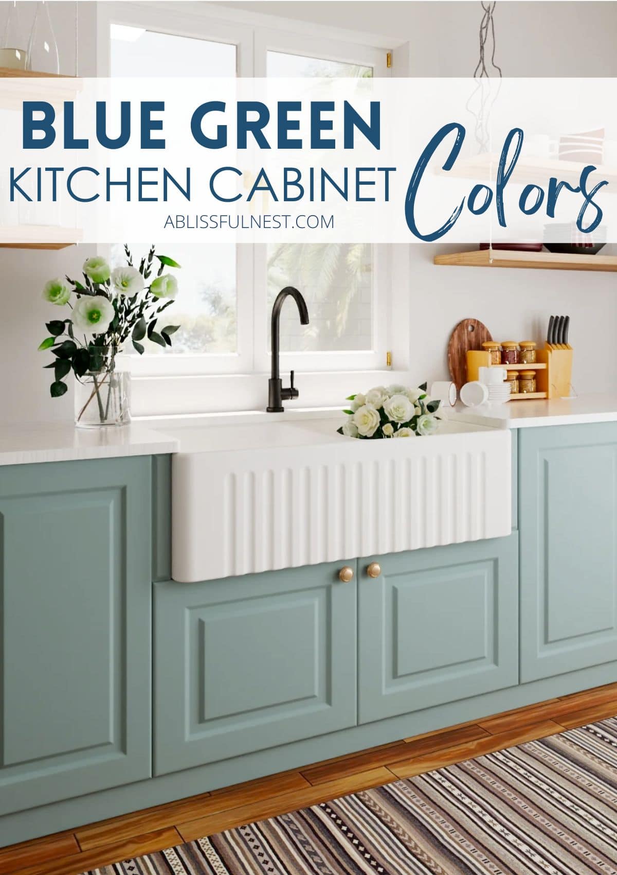 white farmhouse sink with blue green kitchen cabinets