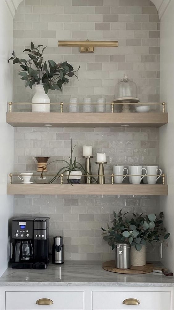 compact coffee bar in a home on a counter with floating shelves for extra storage