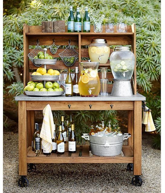 outdoor potting bench being used as an outdoor bar
