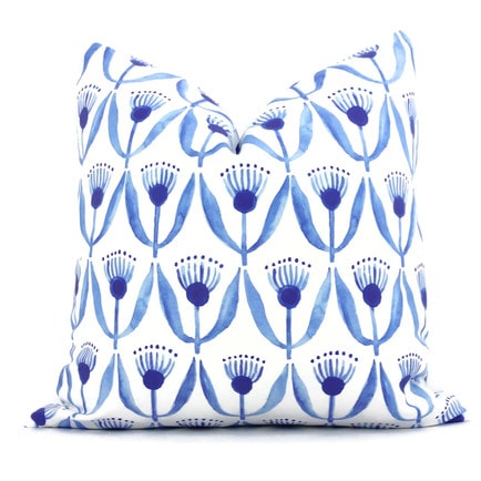 This royal blue dilly flower throw pillow is so fun to add to your living room for spring! #ABlissfulNest