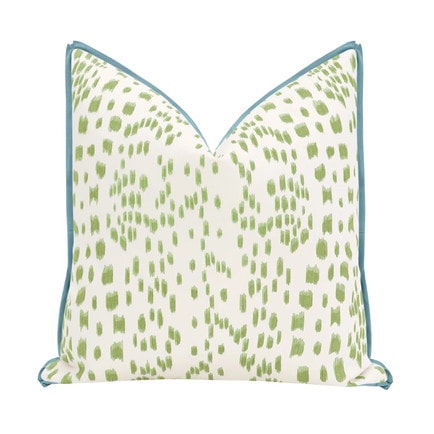 This blue and green flange throw pillow is the perfect throw pillow for spring! #ABlissfulNest