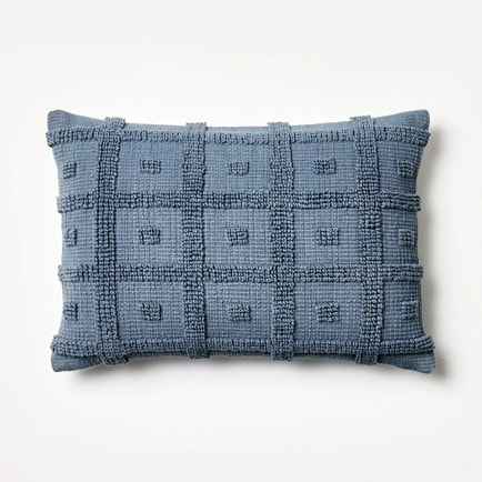 This tufted geo throw pillow is only $25 and the perfect spring throw pillow! #ABlissfulNest