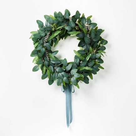 This eucalyptus spring wreath comes with the prettiest green ribbon and is under $50! #ABlissfulNest