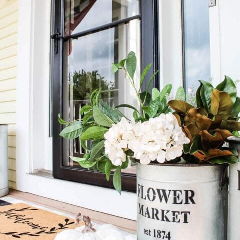 Image for Faux Flowers in Metal Container