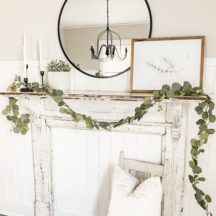 Image for Eucalyptus Drapping Across A Mantel + Candles