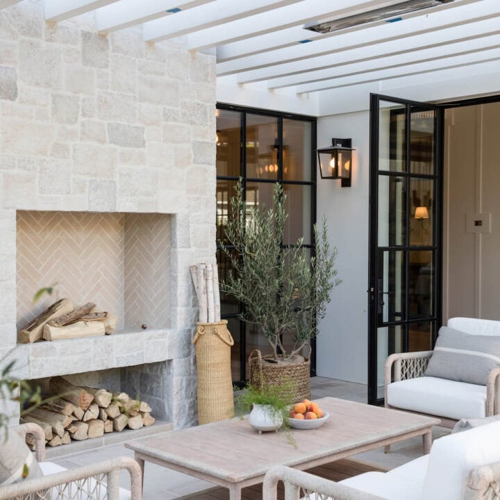 Image for Stone Fireplace Under A Pergola + Comfy Chairs